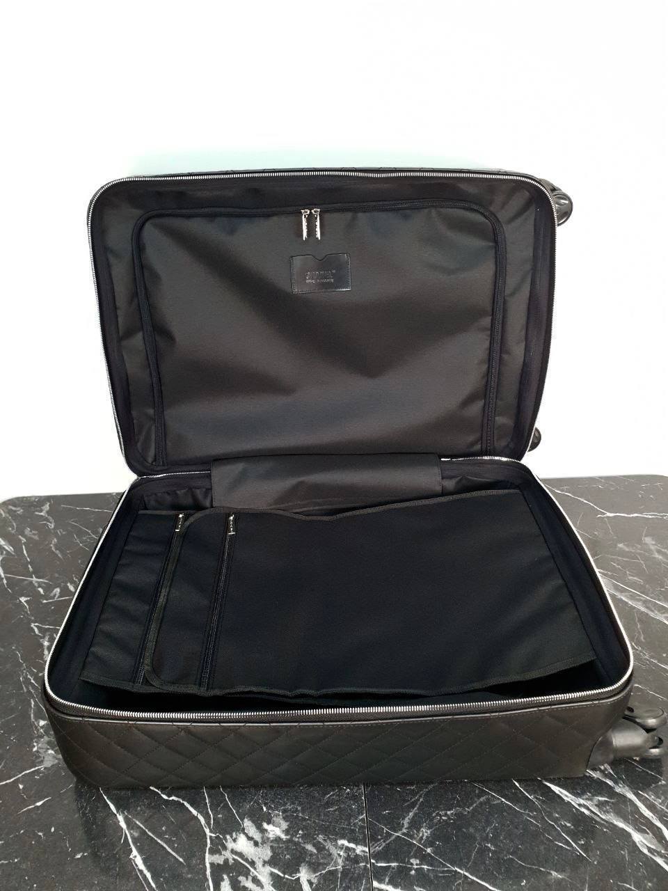 Chanel suit case 60x42x24