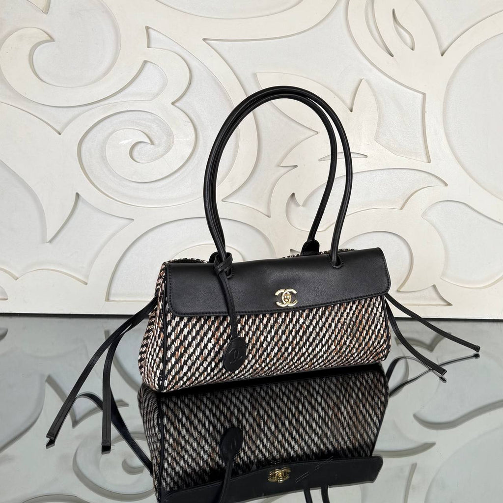 Chanel 26S East-West Shopping Bag

31x14 cm
910680 ⭐️