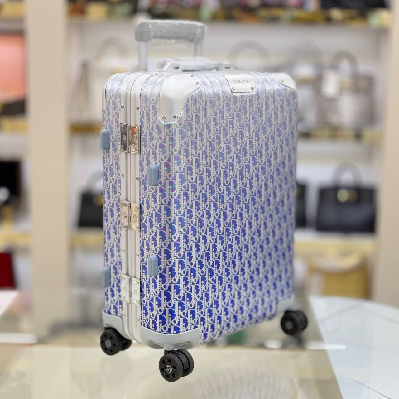 Christian Dior and Rimowa Carry-On Cabin Suitcase
38x50x21 cm