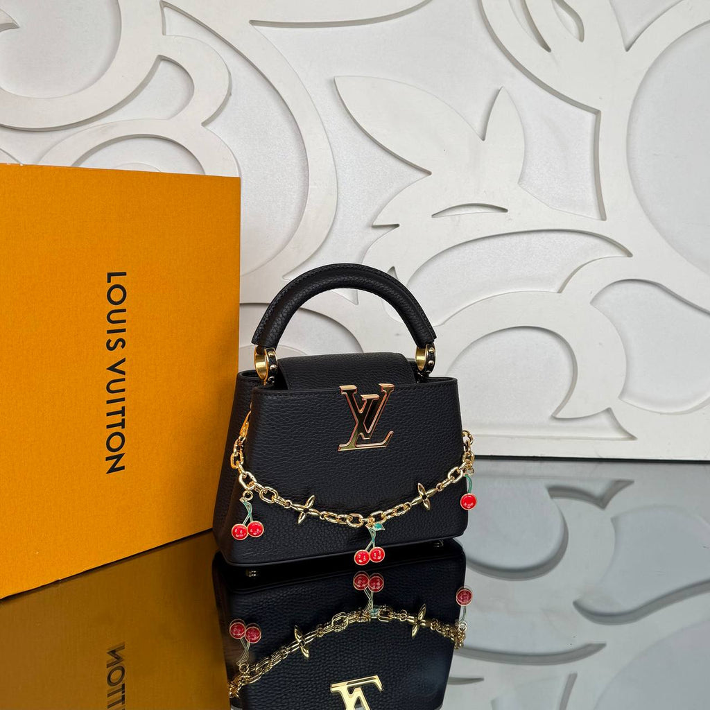 Louis Vuitton LV x TM Capucines Mini

910334 ⭐️