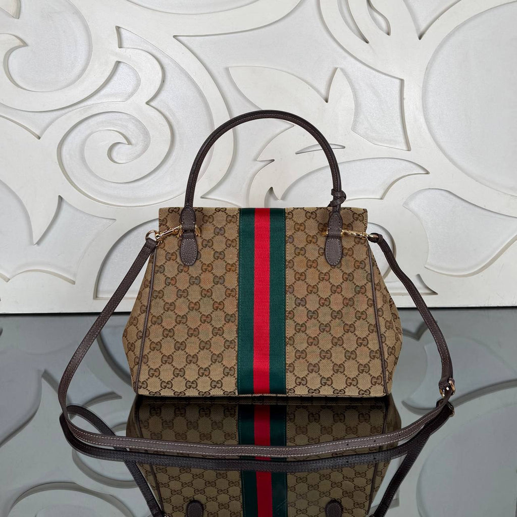 Gucci Paparazzo Medium Top Handle Bag

32x24 cm 
910887 ⭐️