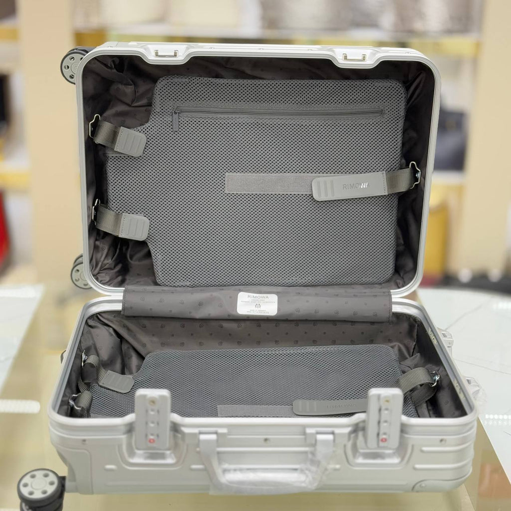 Christian Dior and Rimowa Carry-On Cabin Suitcase
38x50x21 cm
